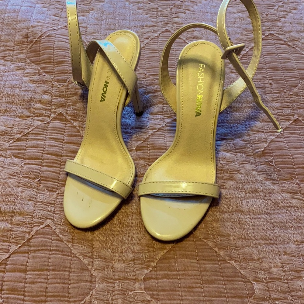 Patent leather nude heels.